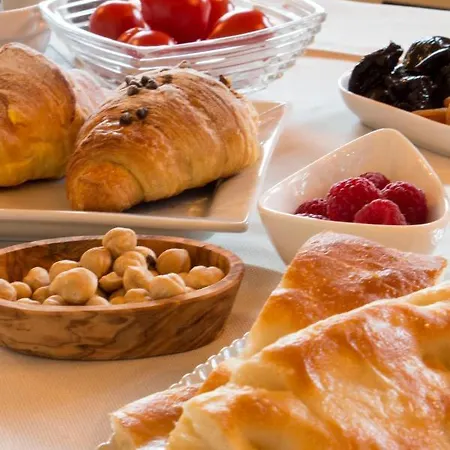 לינה וארוחת בוקר L'aromatario 4*